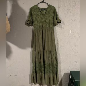 Woman’s olive green long maxi dress.